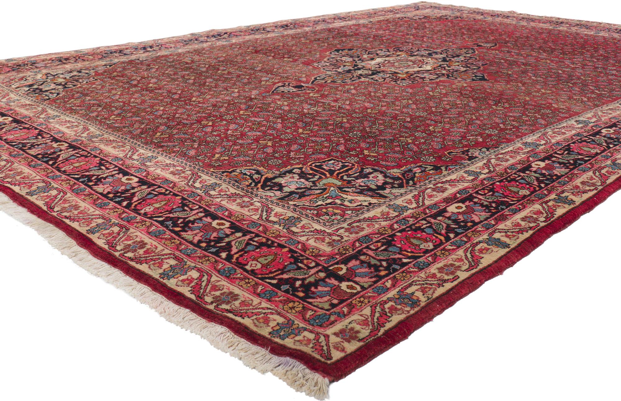 61184 Antique Persian Bijar rug, 07'05 x 11'00.
?With its timeless style, incredible detail and texture, this hand-knotted wool antique Persian Bijar rug is poised to impress. The eye-catching Herati design and traditional color palette woven into