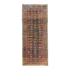 Antique Persian Bijar Rug with Blue and Red Floral Medallion on Black Field
