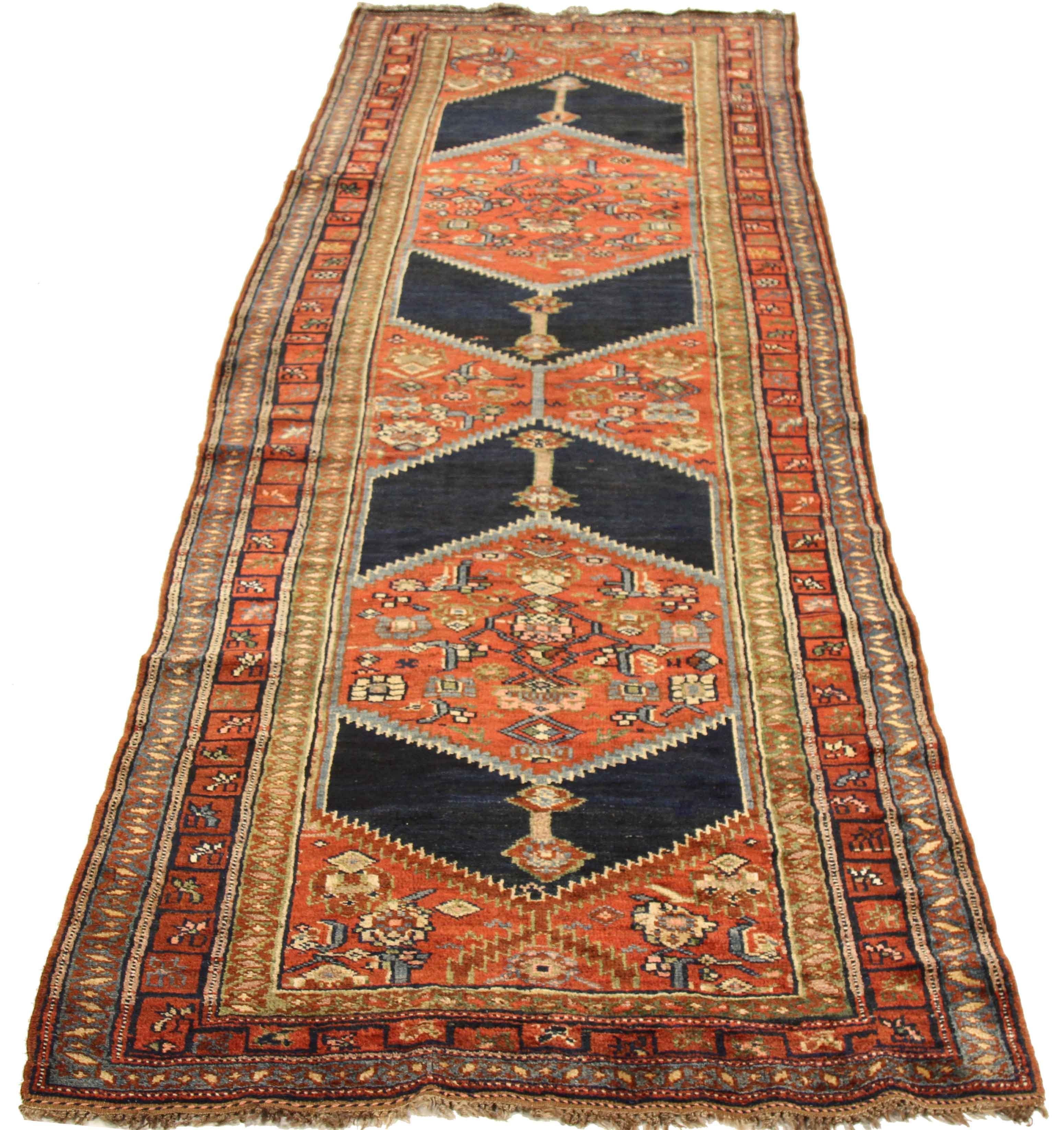 Hand-Woven Antique Persian Bijar Rug with Navy Blue ‘Arrowheads’ on Red Center Field For Sale