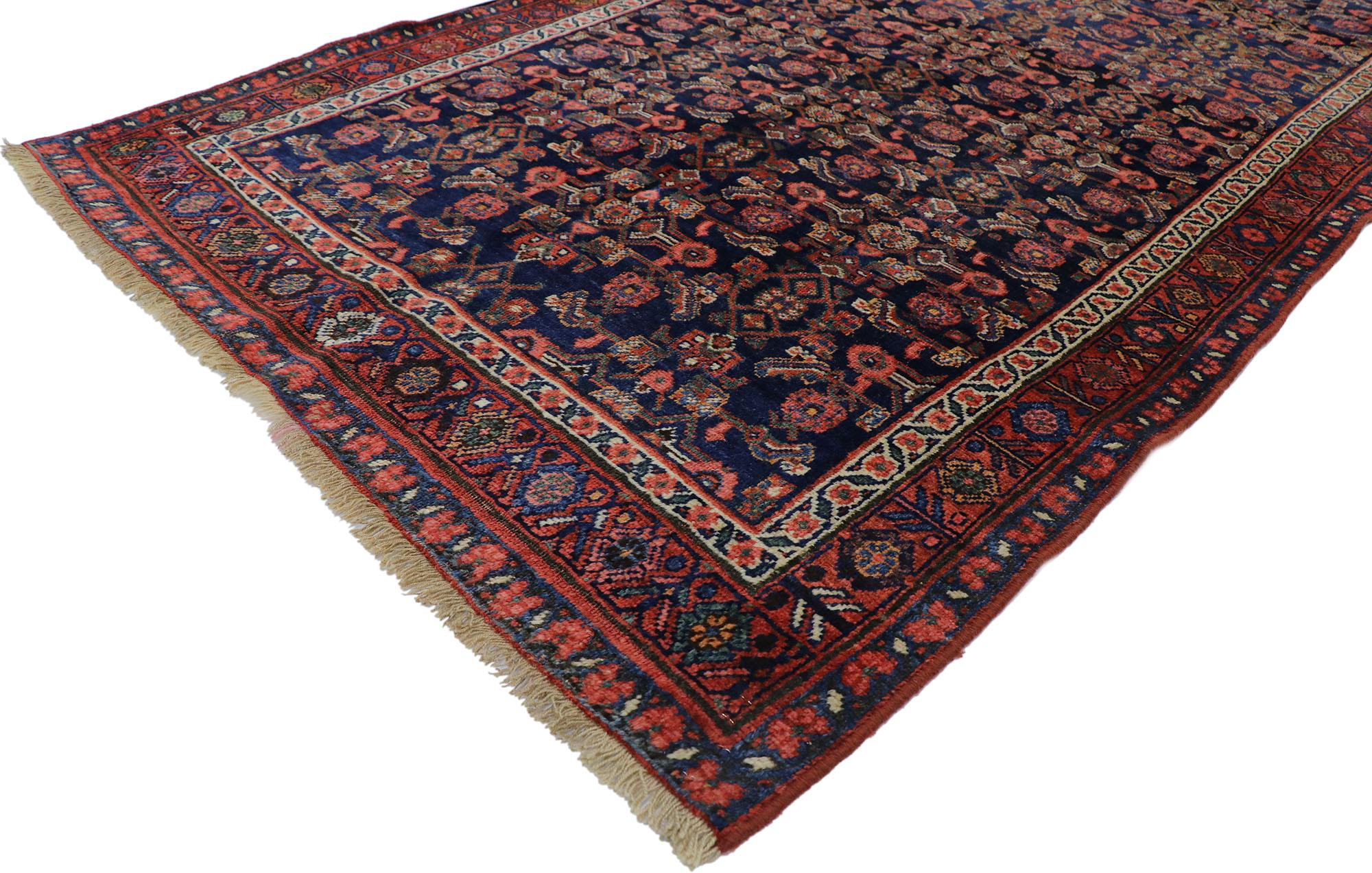 60891 antique Persian Bijar rug with Victorian style 04'02 x 07'03. Rich in color with beguiling beauty, this hand knotted wool distressed antique Persian Bijar rug beautifully embodies a Victorian style. The navy blue field is covered in an