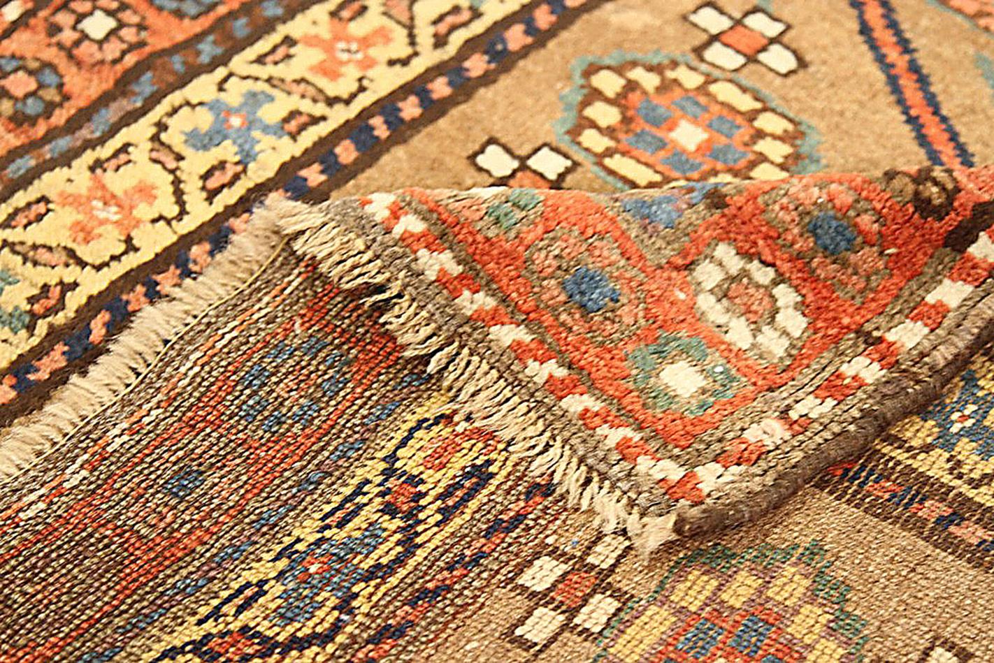Hand-Woven Antique Persian Bijar Runner Rug with Orange & Yellow Floral Medallions For Sale