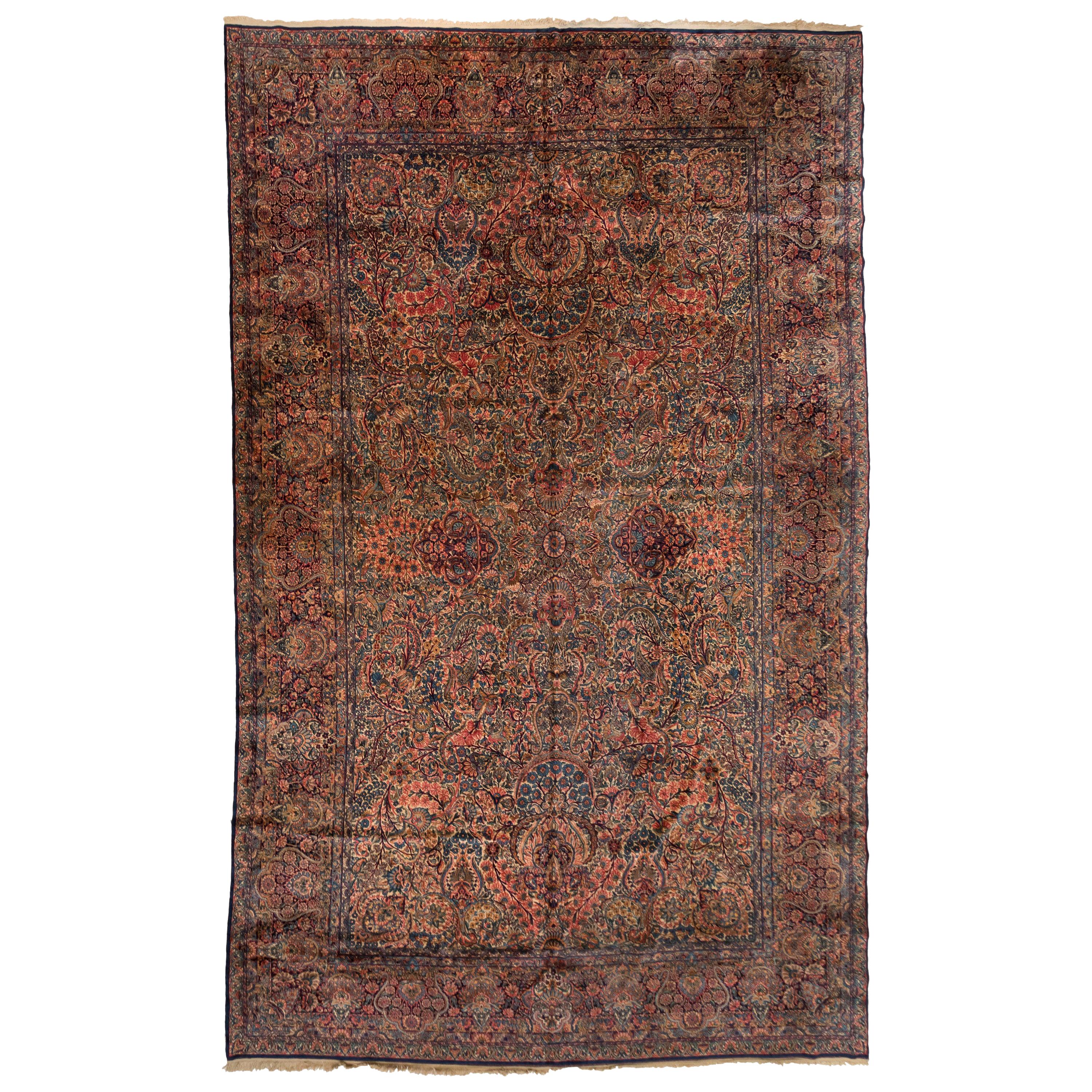 Antique Persian Blue and Rose Floral Palmettes Kirman Large Rug For Sale