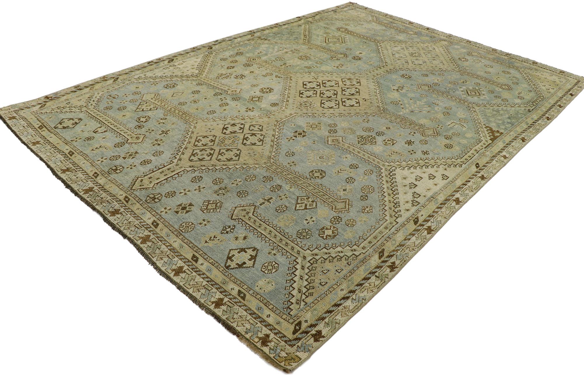 53233 Antique Persian Branched Pole Medallion Shiraz rug. Balancing tribal style and traditional sensibility, this hand knotted wool distressed antique Persian Shiraz rug charms with ease and stays true to the tastefully casual and cozy simplicity