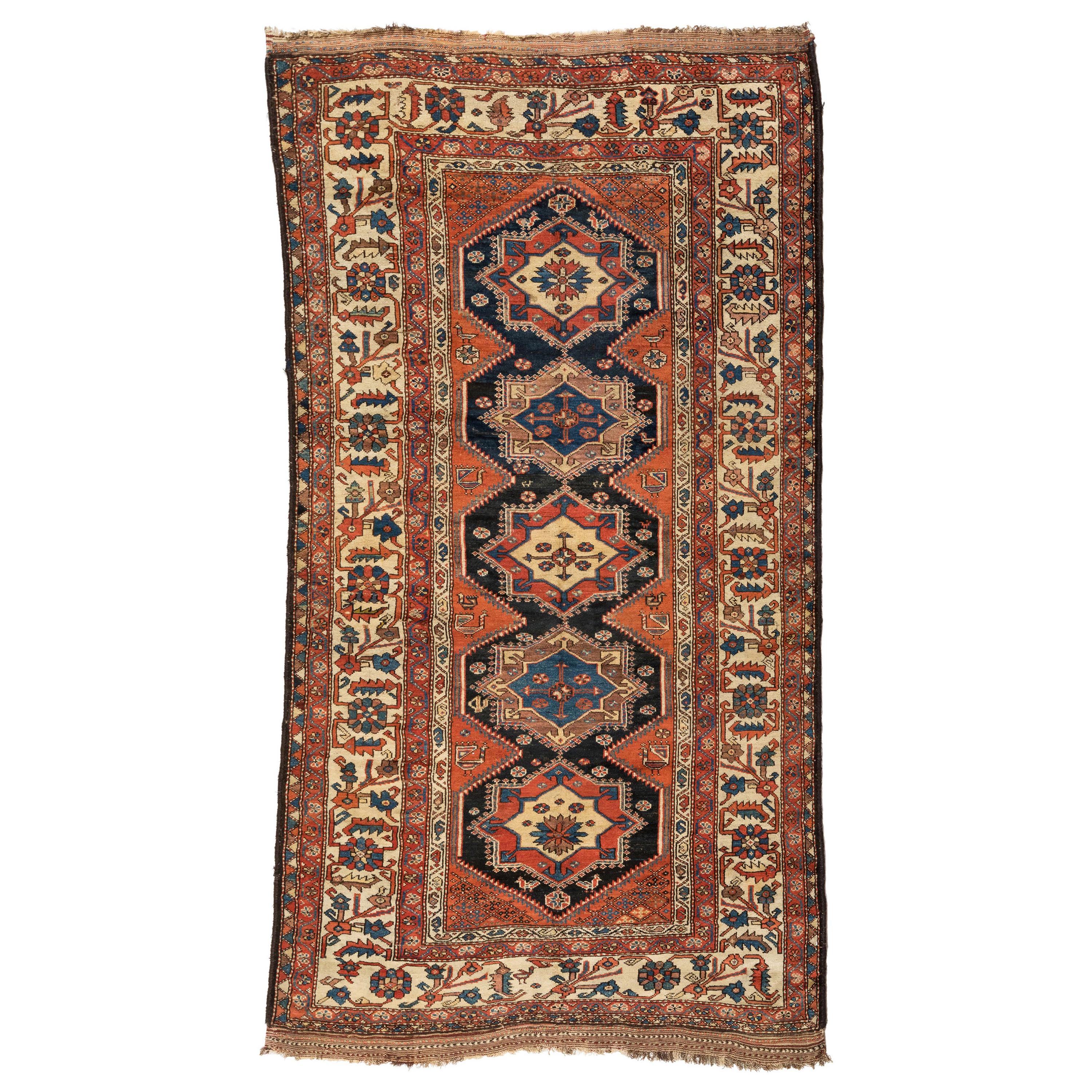 Antigua alfombra persa kurda marrón, hacia 1920