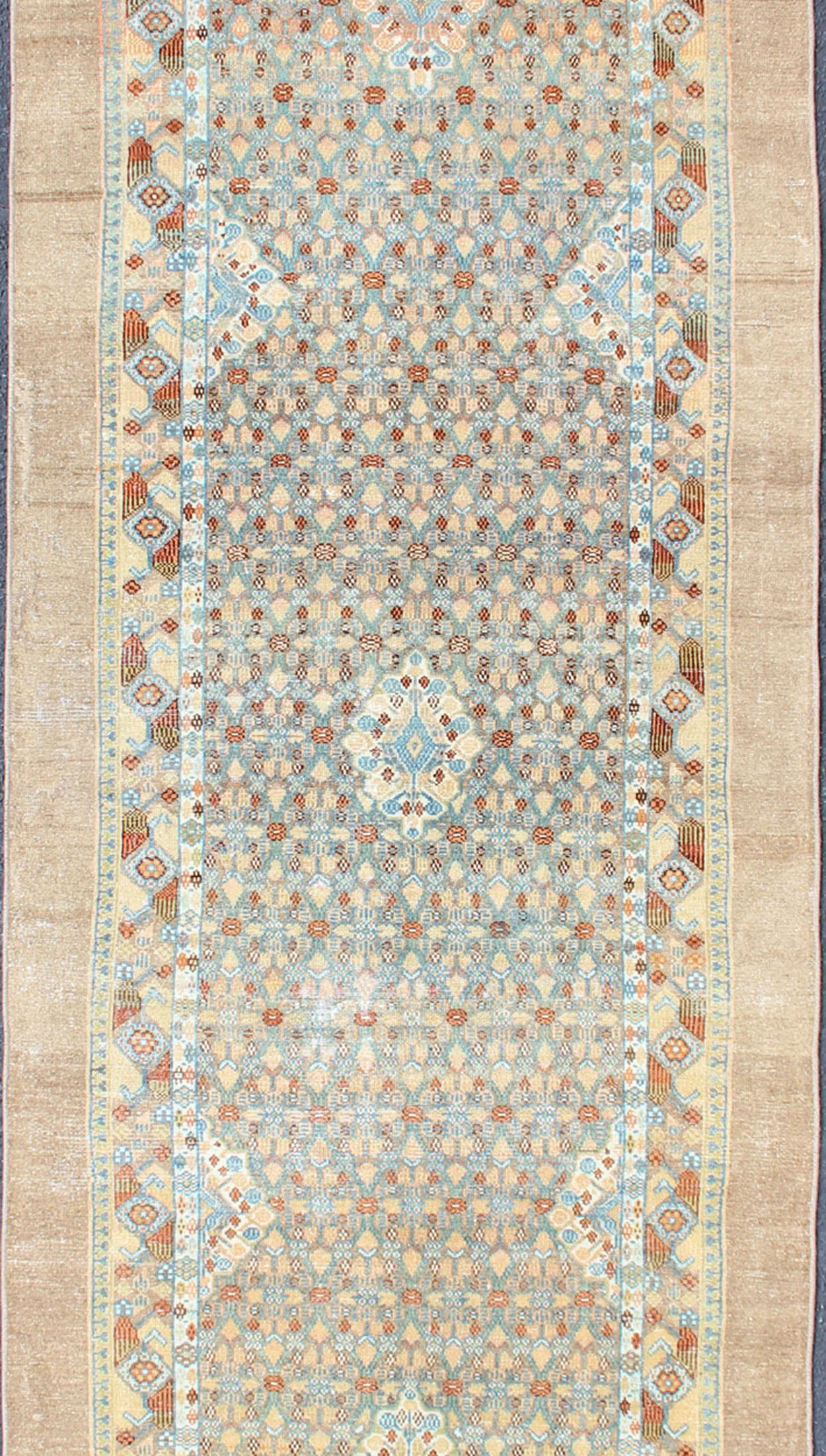 Geometric design Serab antique runner from Persia in multicolored light Tones, rug SUS-2009-643, country of origin / type: Iran / Serab, circa 1900.

This beautiful handwoven, antique Persian Serab runner features a central field imbued with an