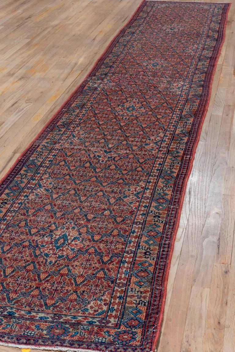 Hand-Knotted Antique Persian Camel Hamadan Narrow Runner, Red & Blue Palette, circa 1910s For Sale