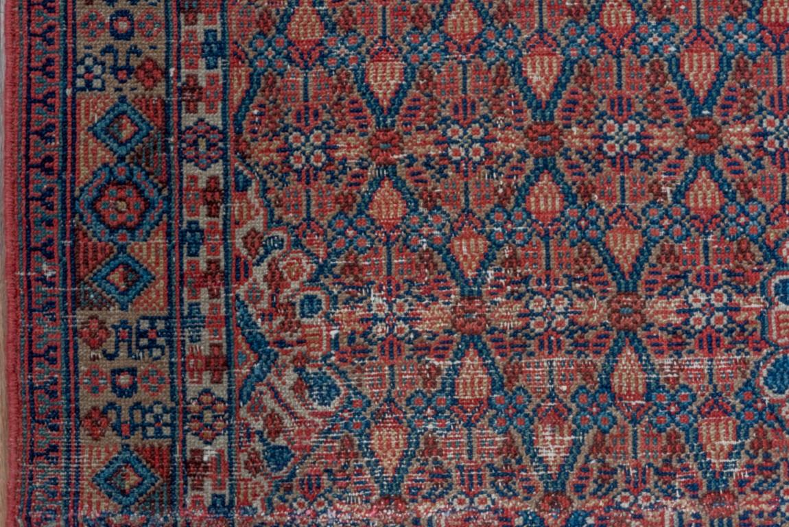 Wool Antique Persian Camel Hamadan Narrow Runner, Red & Blue Palette, circa 1910s For Sale