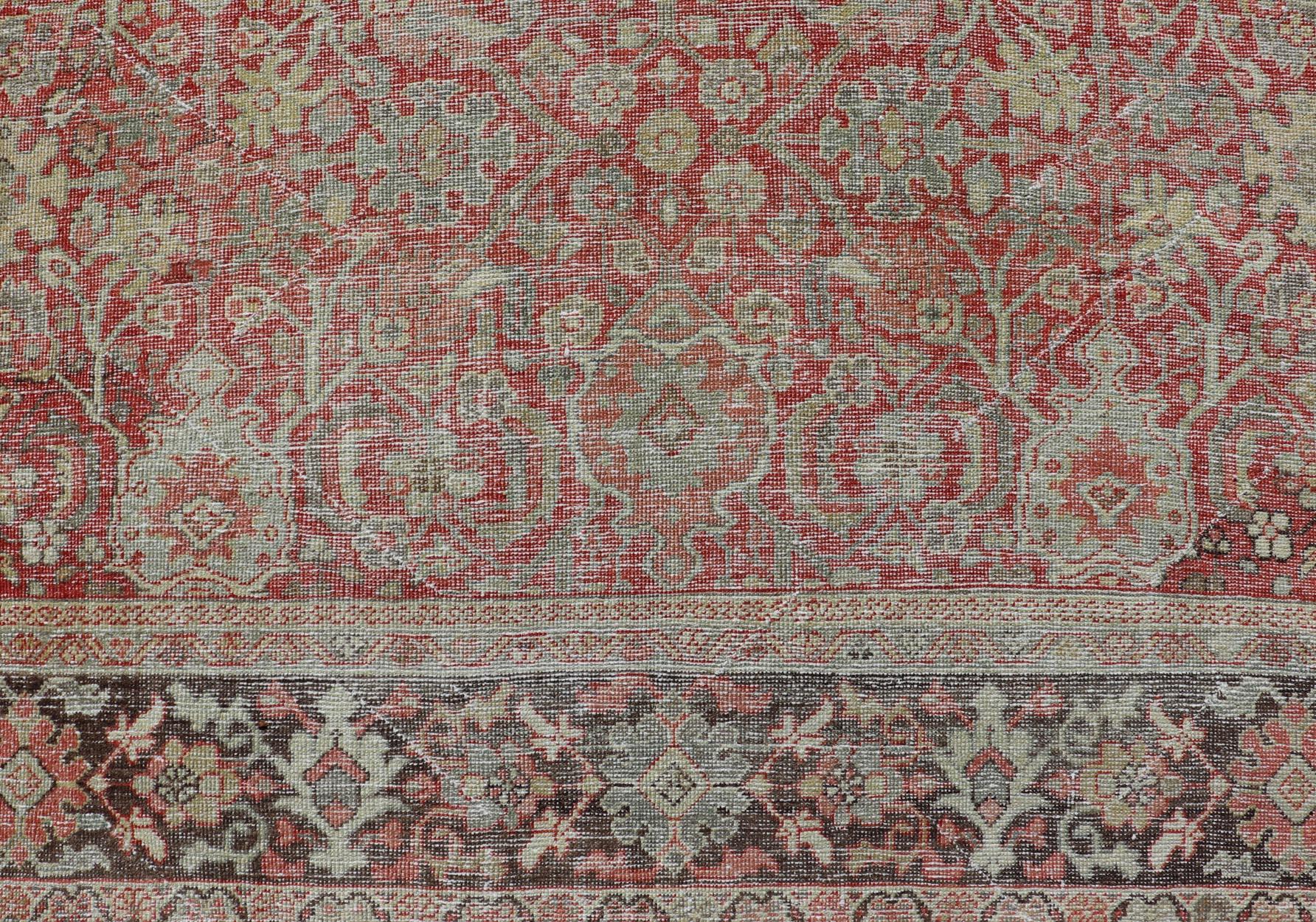 Hand-Knotted Antique Persian Colorful Mahal Rug with All over Floral Design on a Red Field  For Sale