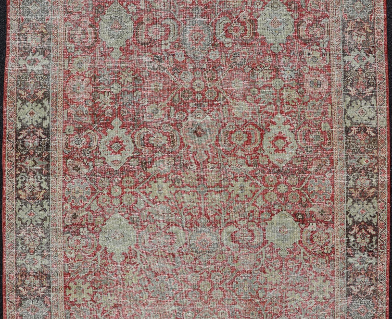 20th Century Antique Persian Colorful Mahal Rug with All over Floral Design on a Red Field  For Sale