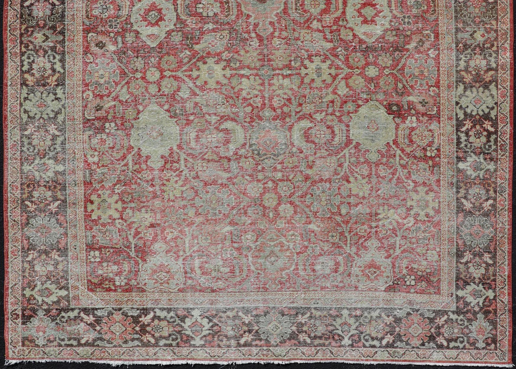 Wool Antique Persian Colorful Mahal Rug with All over Floral Design on a Red Field  For Sale