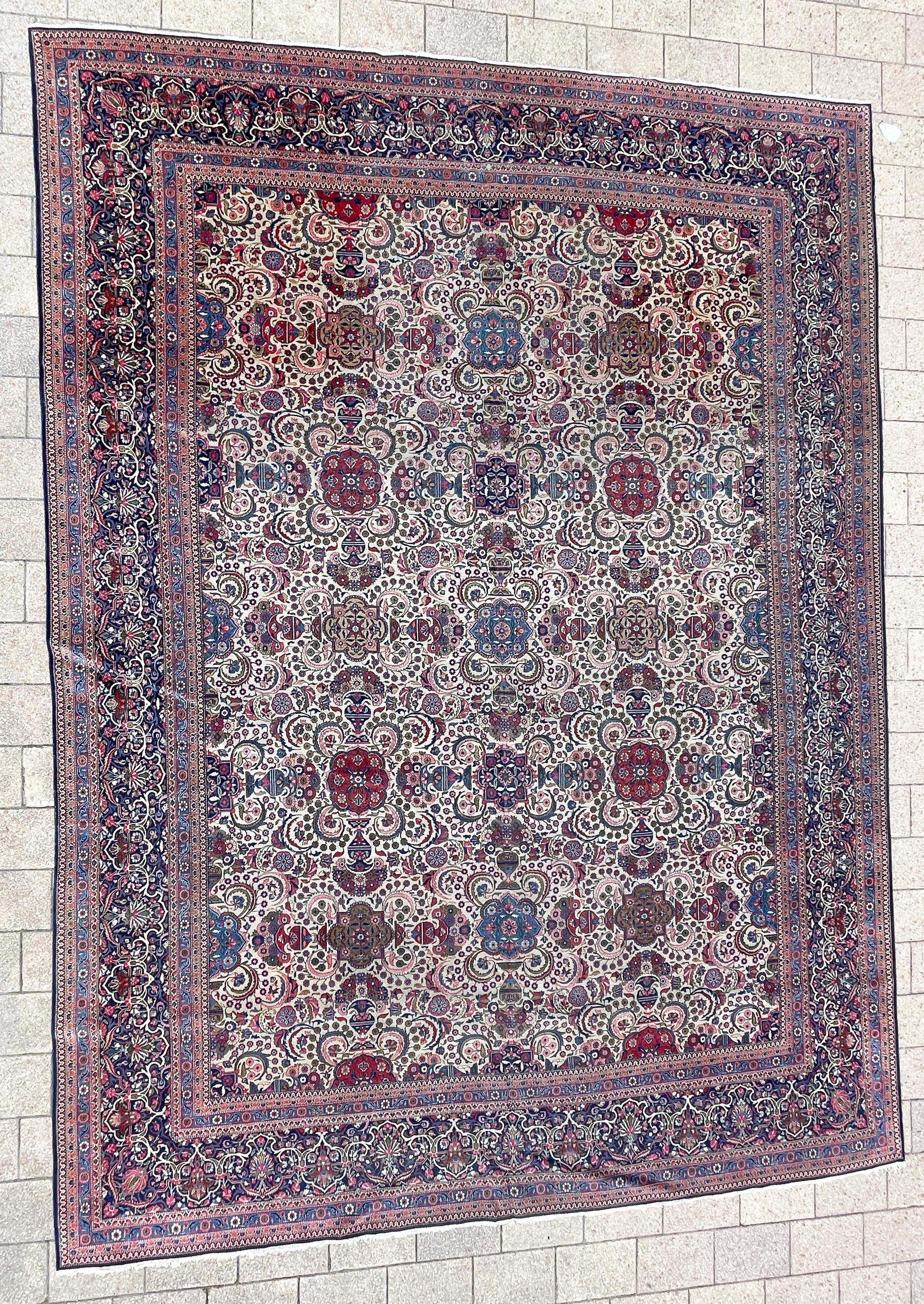 
You could possess an exquisite antique Persian Dabir Kashan carpet steeped in a captivating history. This eloquent portrayal highlights the intricate features of the rug, encompassing an ivory background, a striking blue border, and an elaborate