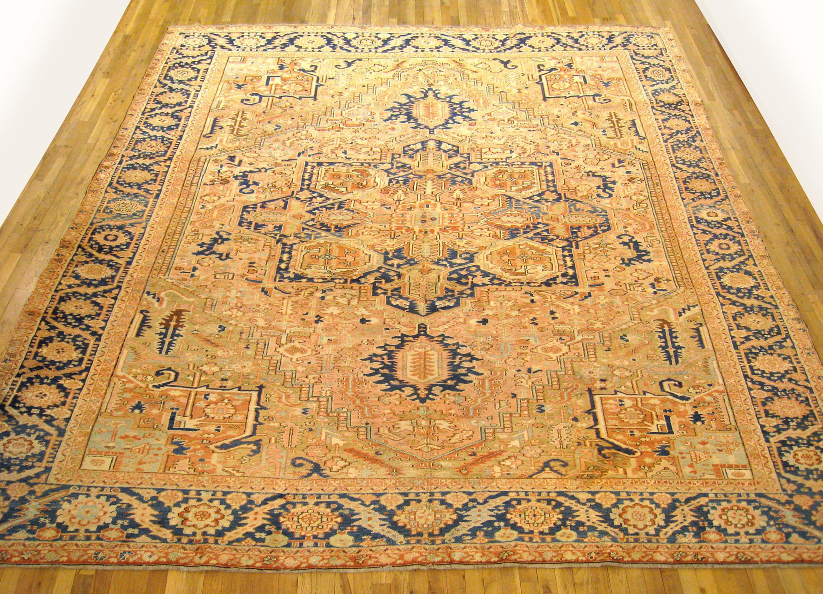 Vintage Persian Heriz oriental rug, large size

A vintage Persian Heriz oriental rug, size 13'6