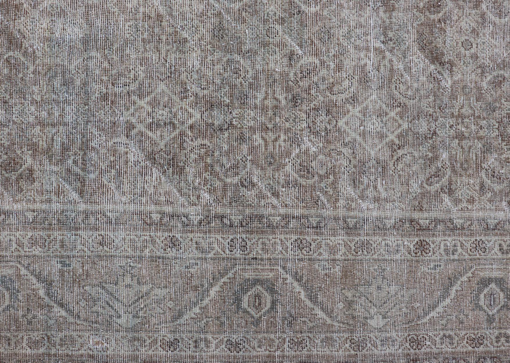 Antique Persian Distressed Mahal Rug in Warm Earthy Tones with All-Over Design. Keivan Woven Arts / rug V21-0402, country of origin / type: Iran / Mahal, circa 1920

Measures: 10'4 x 13'3 

This beautiful distressed antique Persian Mahal rug