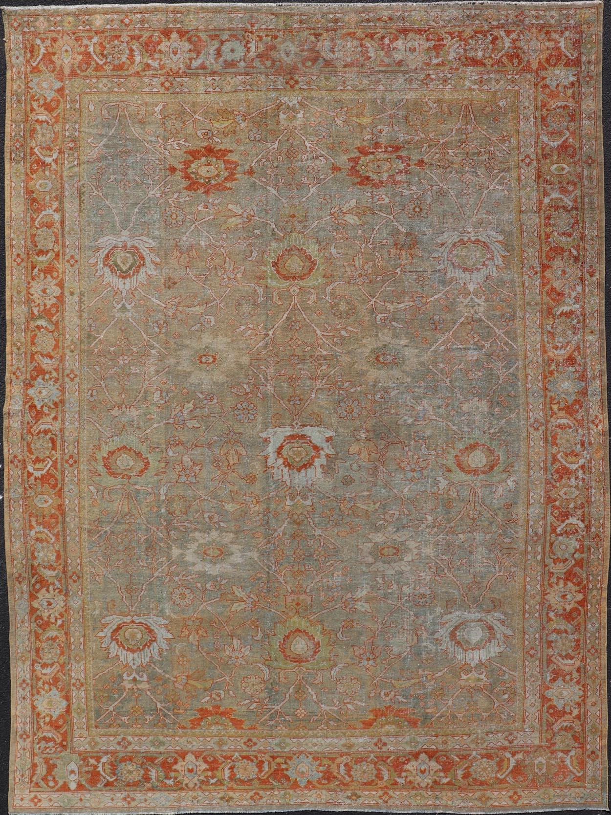 Antique Persian Distressed Sultanabad Rug in Light Green, Lt. Blue, Green, Red