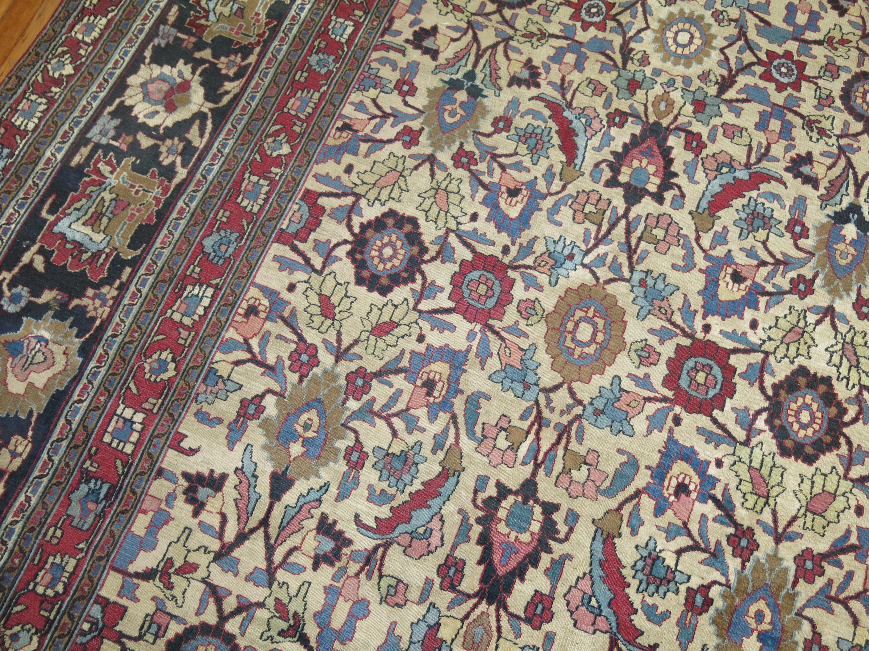 A Persian Classic woven in the city of Doroksh. The pattern and colors can be mistaken for a 19th century persian Mahal/Sultanabad rug but the weave proves otherwise. Ivory field, black border with other earthy color. Can be considered a great