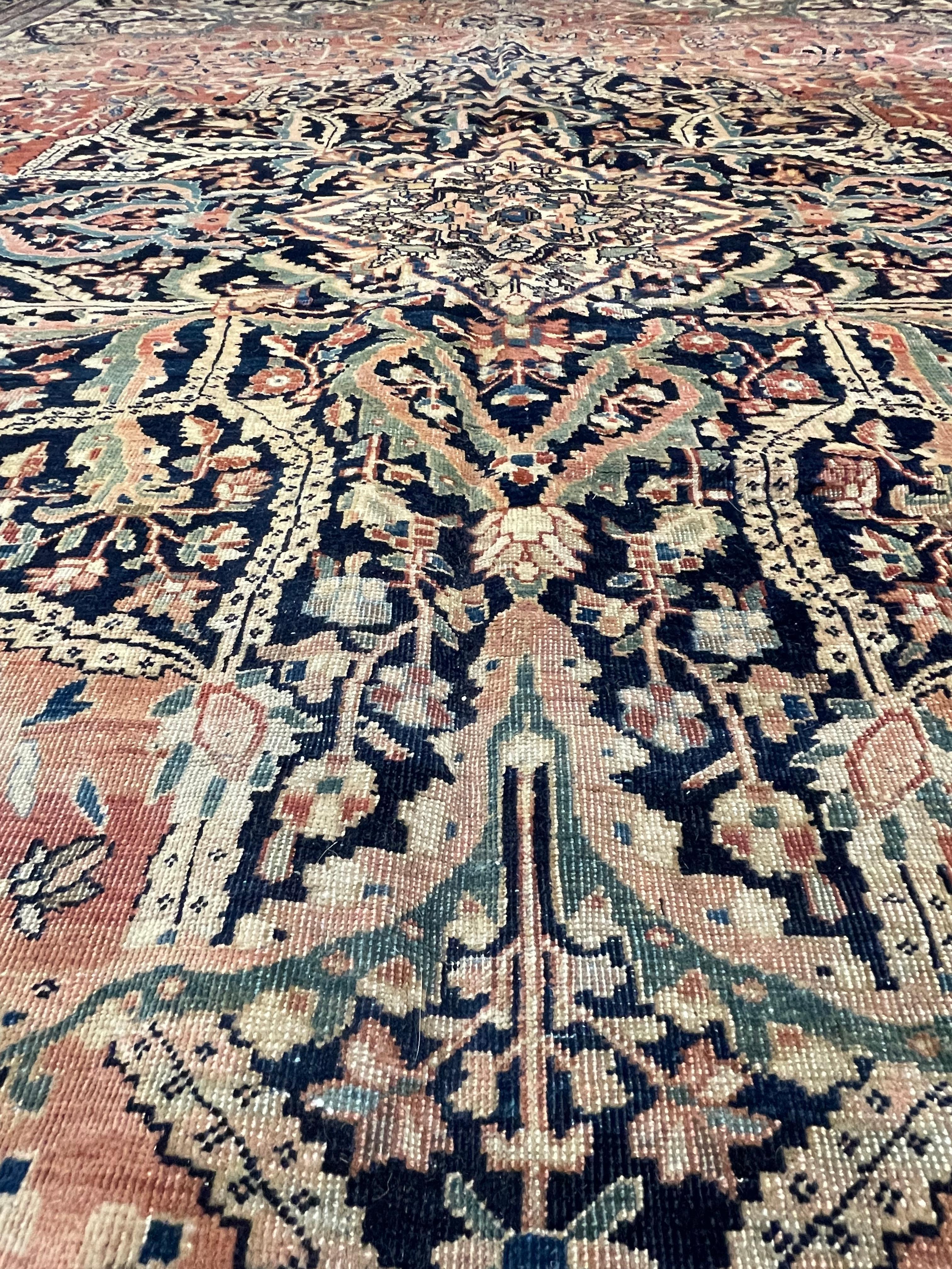 This rug is hand woven in the town of Farahan located in west Persia.Farahan carpets are very finely woven with hard wool and they are clipped very flat. The restrained style of decoration is almost gothic in character. Farahan carpets came to