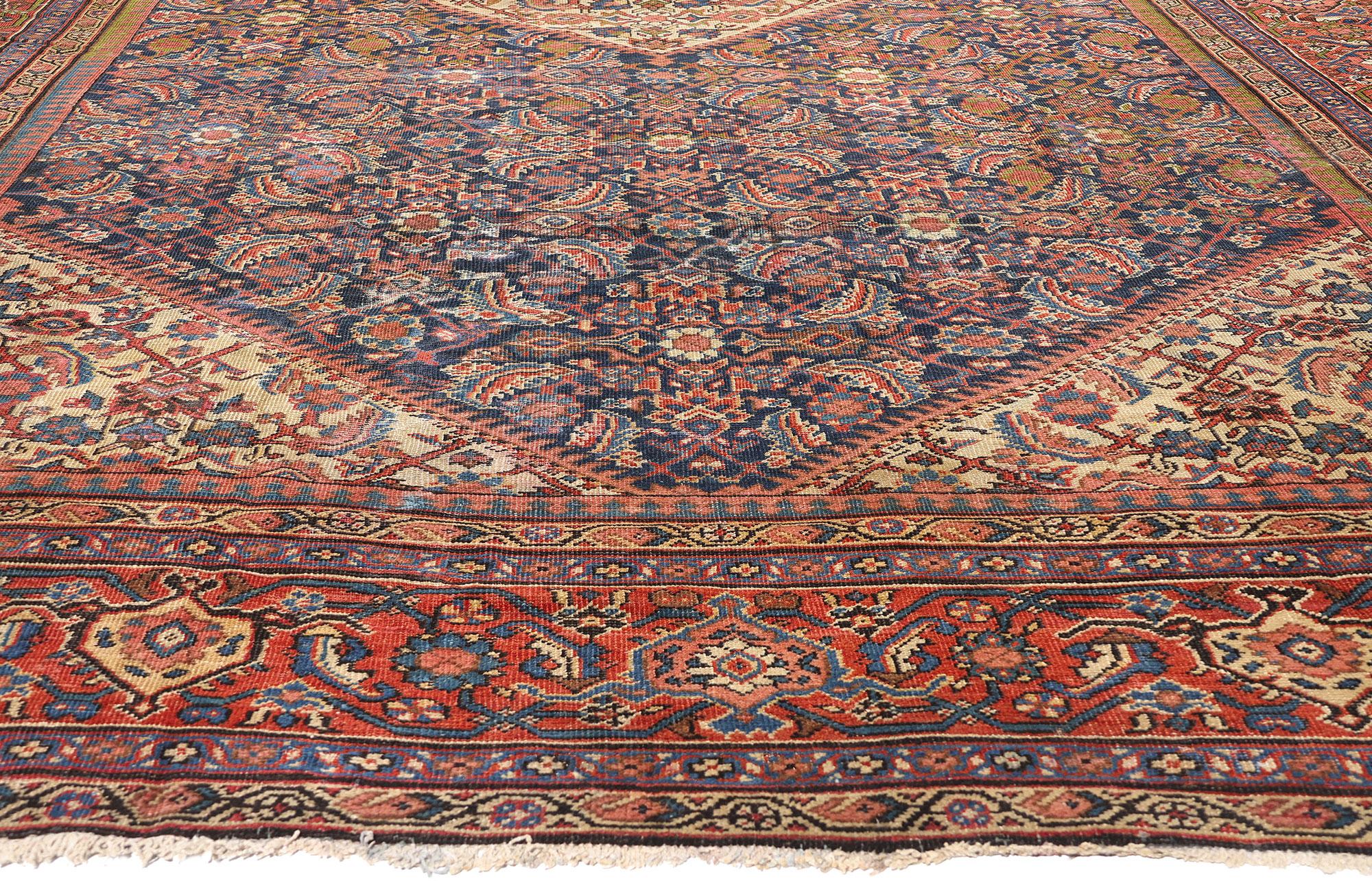 73023 Late 19th Century Antique Persian Farahan Rug, 10'09 x 17'05. A masterpiece of Persian artistry, this hand knotted wool Late 19th Century antique Persian Farahan rug captivates with its intricate design and mesmerizing interplay of colors.