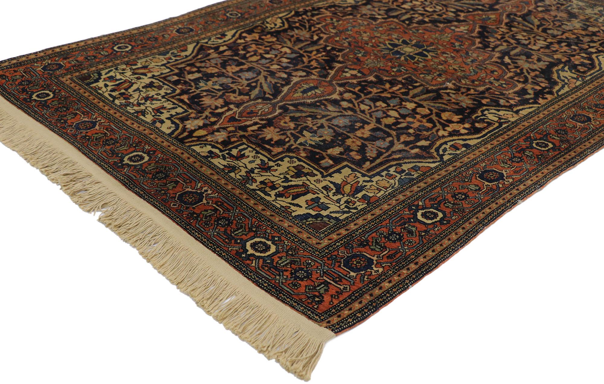 77619 antique Persian Farahan rug with Arts & Crafts style. With a timeless botanical pattern and naturalistic design elements, this hand knotted wool antique Persian Sarouk Farahan rug will take on a curated lived-in look that feels timeless while