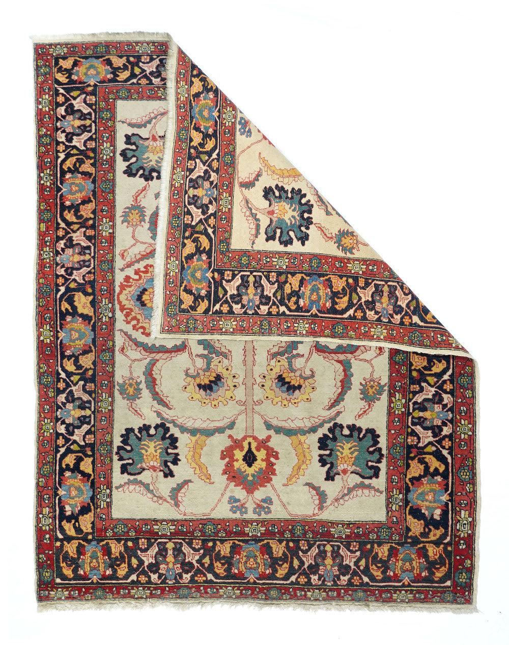 Farahan is a village located in west central Iran, north of the city of Arak, and is known for its finely knotted late 19th century rugs. Most Farahan rugs have a geometric pattern, although some curvilinear rugs are woven in the region as well.