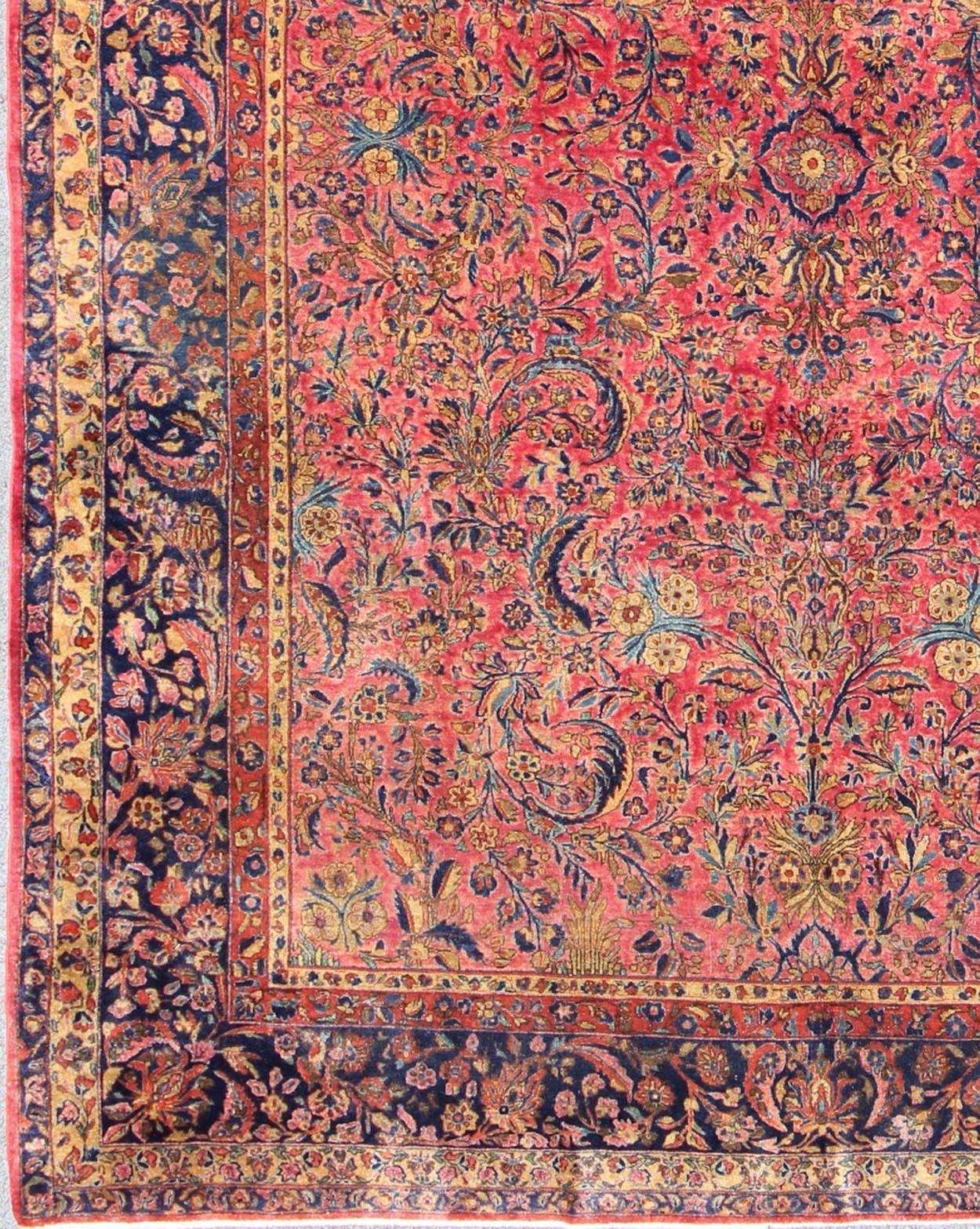 Manchester Kashan rugs by Keivan Woven Arts. Such as this rug,  are among the finest Persian rugs of 1900 era. This gorgeous antique rug (circa 1900) has a deep blue border that frames the attractive background of faded red. Within the frames are