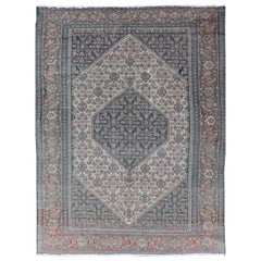 Tapis persan ancien de Senneh raffiné avec médaillon et motif géométrique tribal