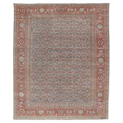 Tapis persan ancien Senneh à tissage fin avec motif Herati sur fond bleu 