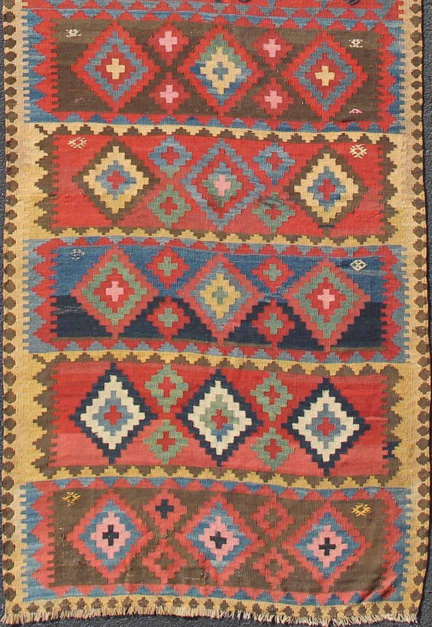 Tribal Persian Kilim rug with all-over diamond and geometric design, rug 19-0804, country of origin / type: Iran / Kilim, circa 1900

Featuring an all-over geometric diamond design, with complementary geometric motifs throughout, this unique, 1900's