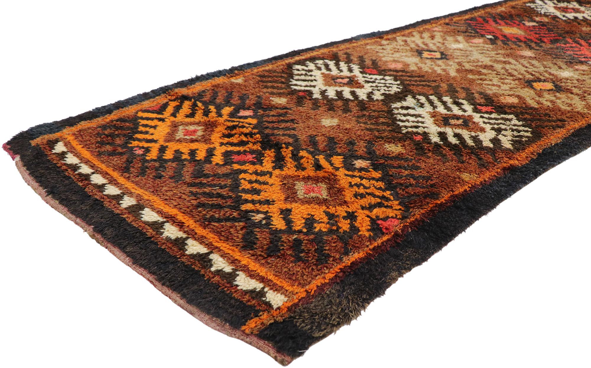 78073 antique Persian Gabbeh Runner with Mid-Century Modern Tribal style 03'02 x 10'09. With its warm hues and rugged beauty, this hand-knotted wool antique Persian Gabbeh runner beautifully embodies a Mid-Century Modern tribal style. The abrashed