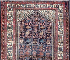 Antique Persian Hamadan Rug with Deep Indigo Field With Tribal Motifs