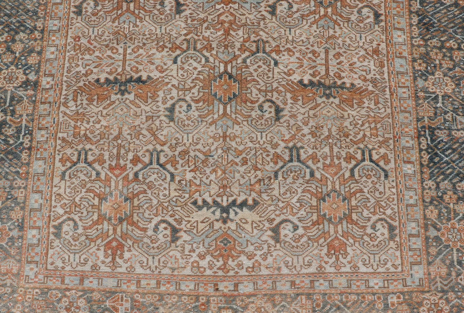 Wool Antique Persian Gallery Heriz Rug with Geometric Design in Copper and Blue For Sale