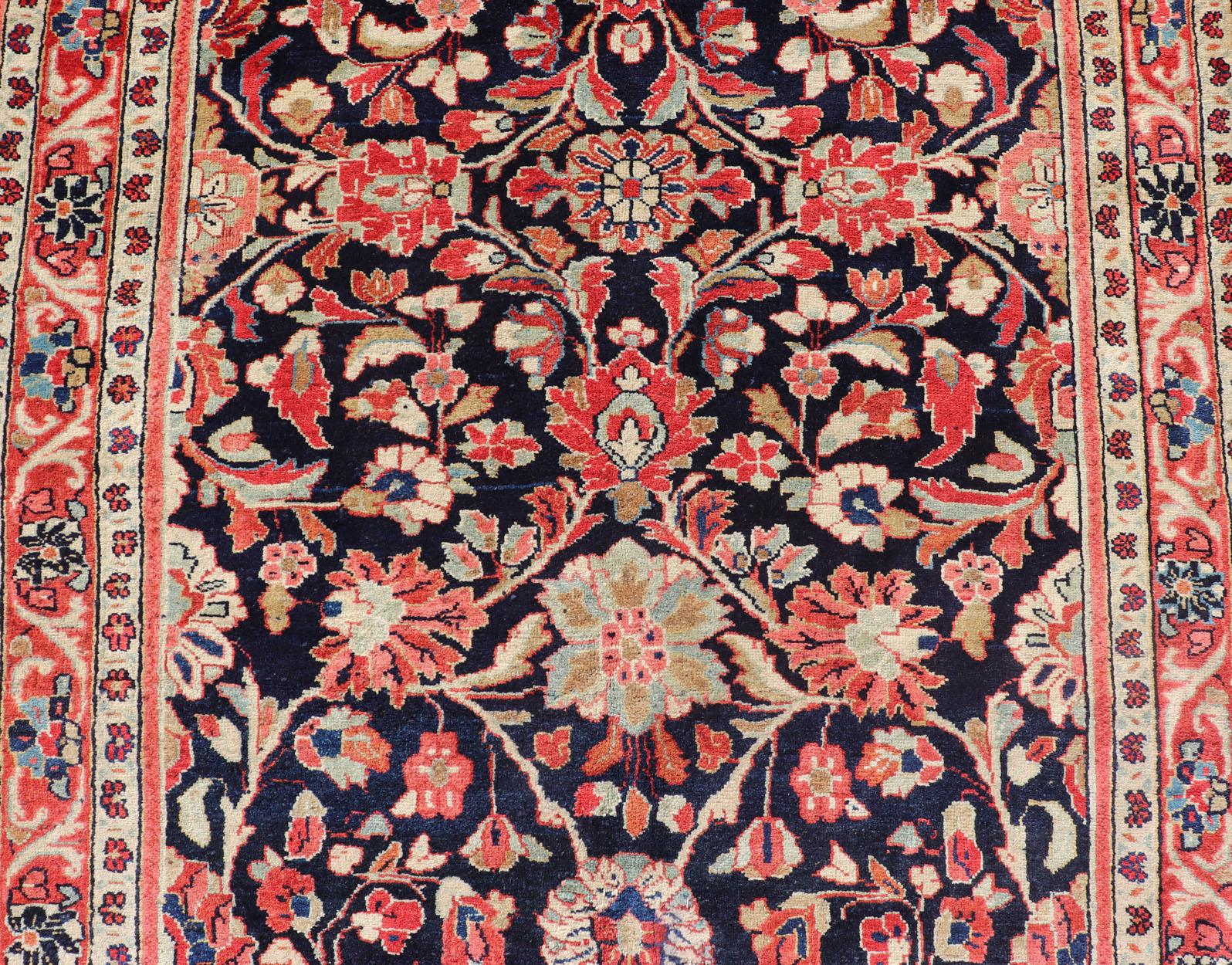 Sultanabad Antique Persian Gallery Runner with Floral Design in D. Blue & Jewel Tones For Sale