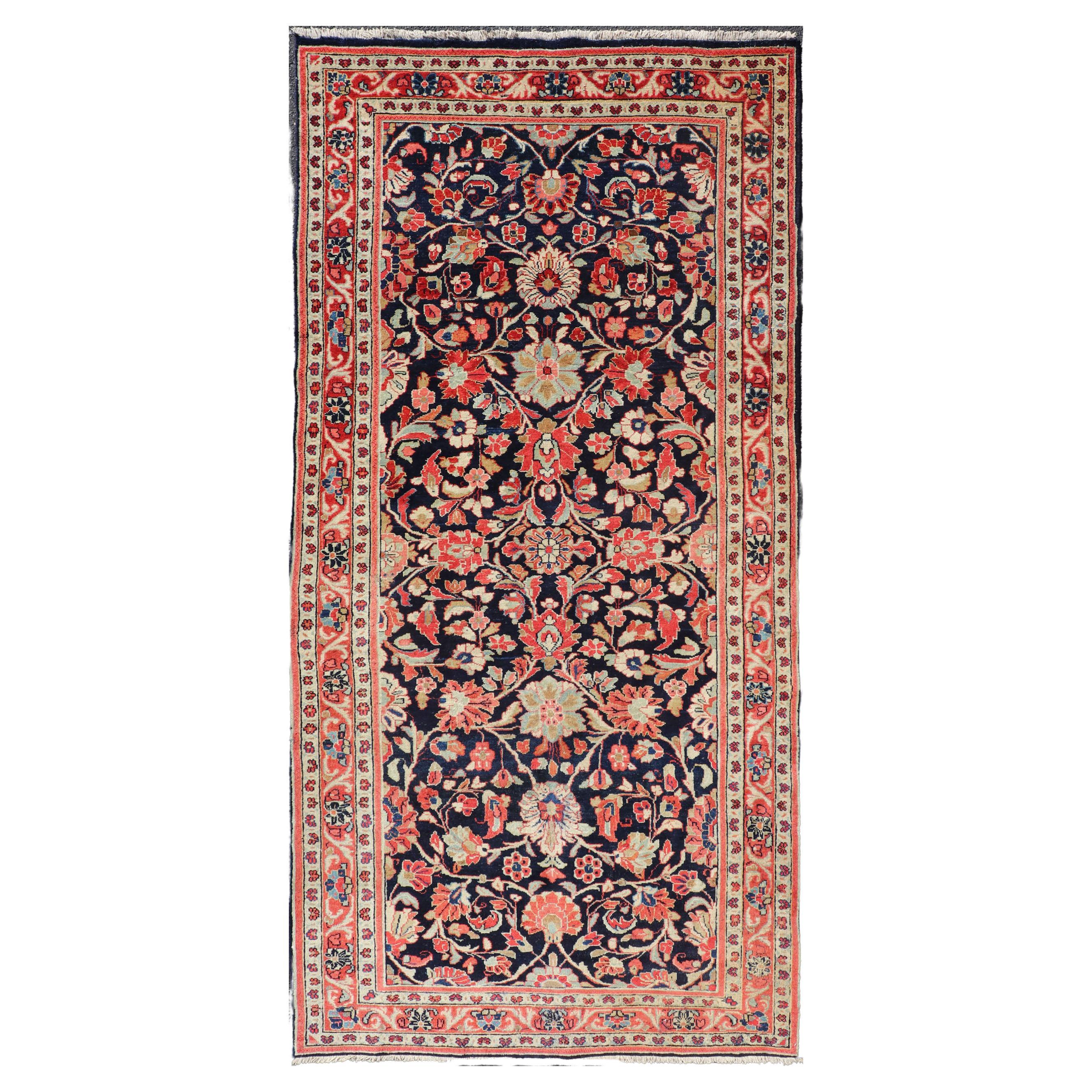 Antique Persian Gallery Runner with Floral Design in D. Blue & Jewel Tones For Sale