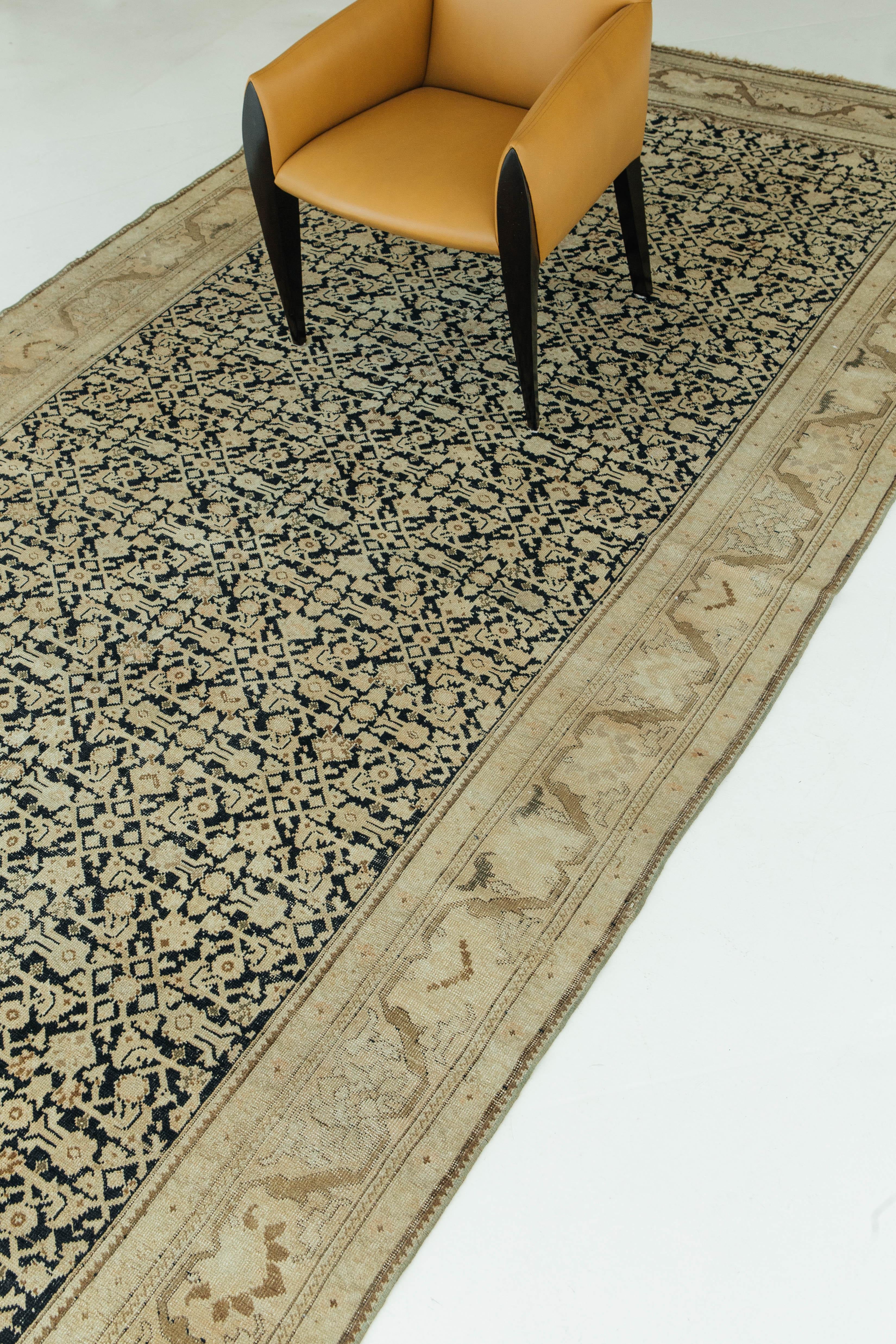 An antique Persian Gharabagh runner that is luxurious and timely. This piece intractly weaves together gold, blue, black, and brown colors into a beautiful pile weave. Traditional floral and tribal motifs leave lasting impressions.



Rug
