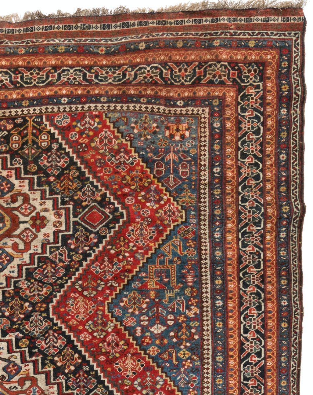 Hand-Knotted Antique Persian Ghashgai Red and Navy Tribal Geometric Rug, circa 1920s 1930s For Sale