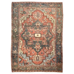 Antique tapis persan en vert et terre cuite Serapi, vers 1880-1900