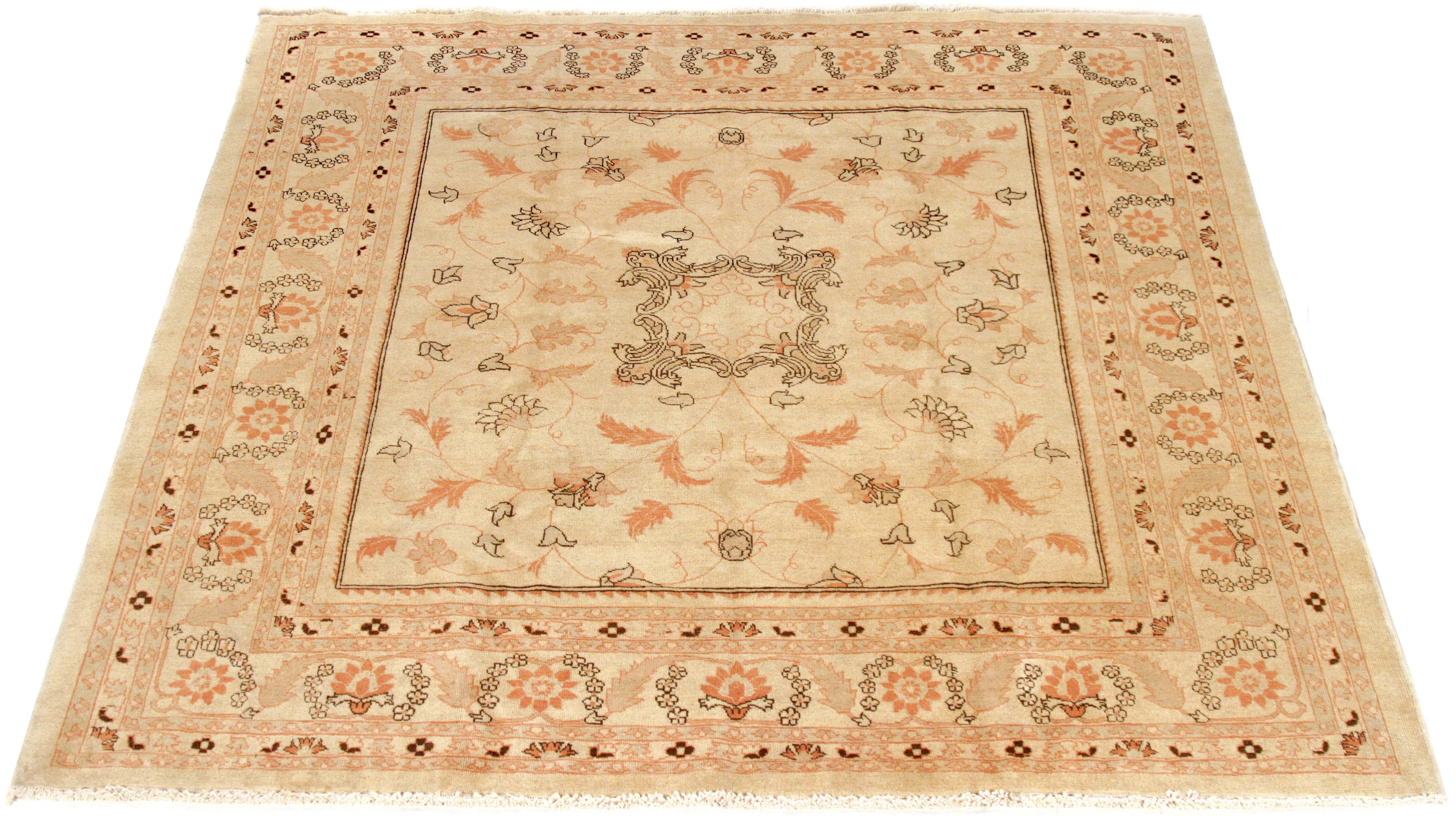 Antique Persian rug handwoven from the finest sheep’s wool and colored with all-natural vegetable dyes that are safe for humans and pets. It’s a traditional Haji Jalili design featuring mixed floral details in brown and black on an ivory field. It
