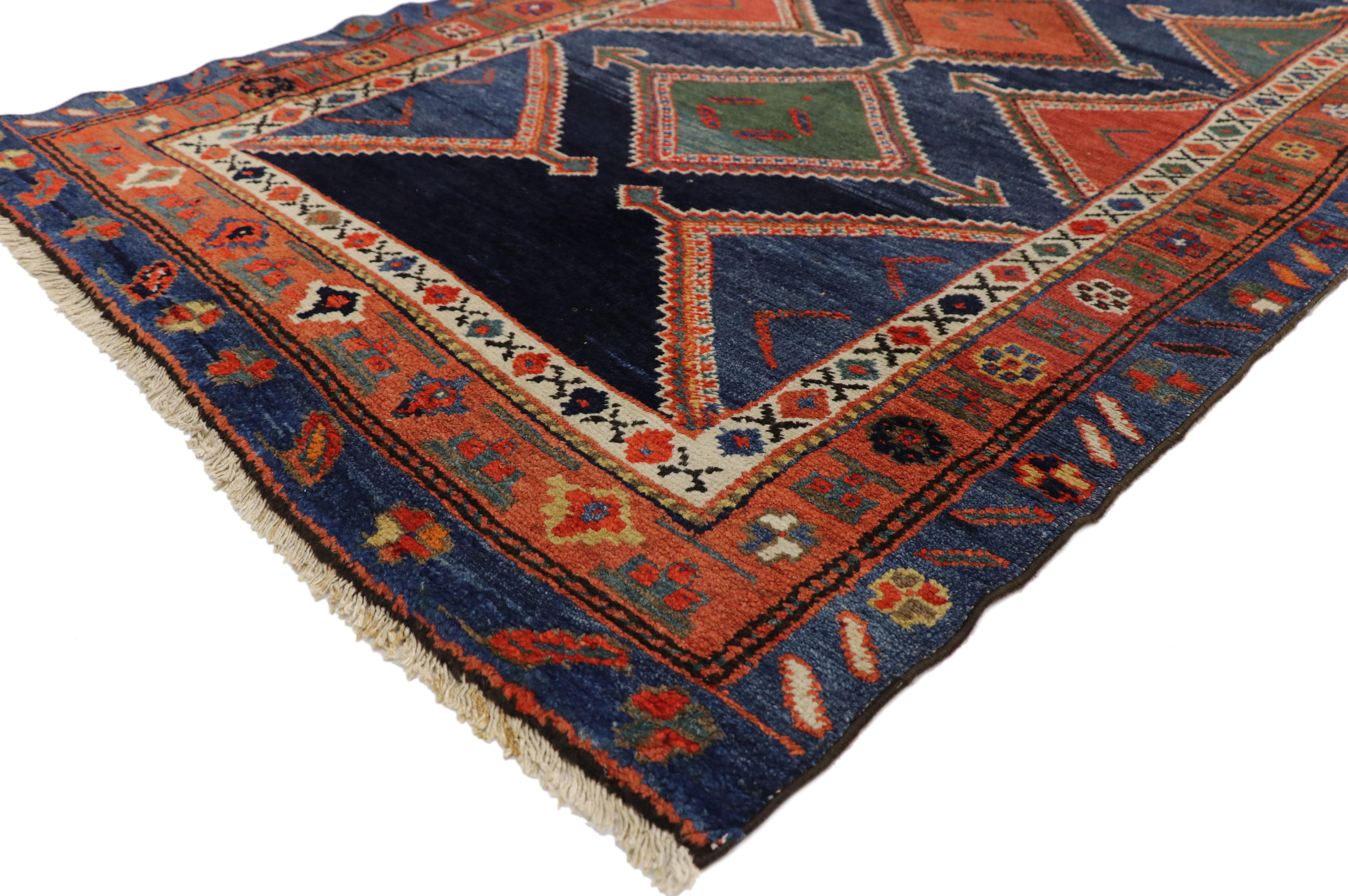73325, antique Persian Hamadan Chenar runner, long hallway runner. Bright and dynamic with visual appeal, this hand knotted wool antique Persian Hamadan Chenar hallway runner features a pole medallion composed of an alternating row of stepped
