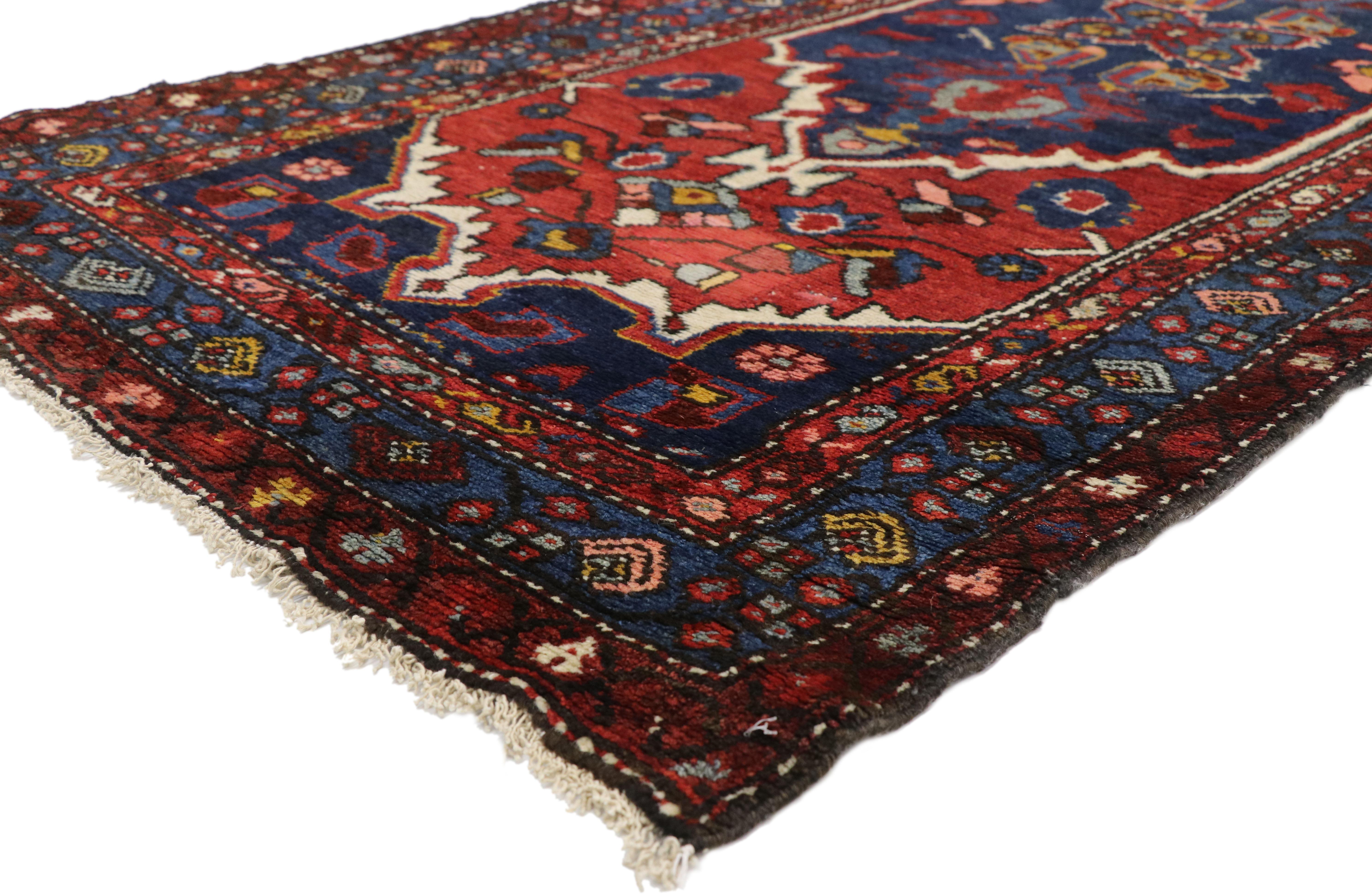 72851, antique Persian Hamadan extra-long hallway runner with English Manor Tudor style. Dignified with bespoke style, this antique Persian Hamadan runner features a pair of large-scale navy blue cartouche medallions outlined in ivory and surrounded
