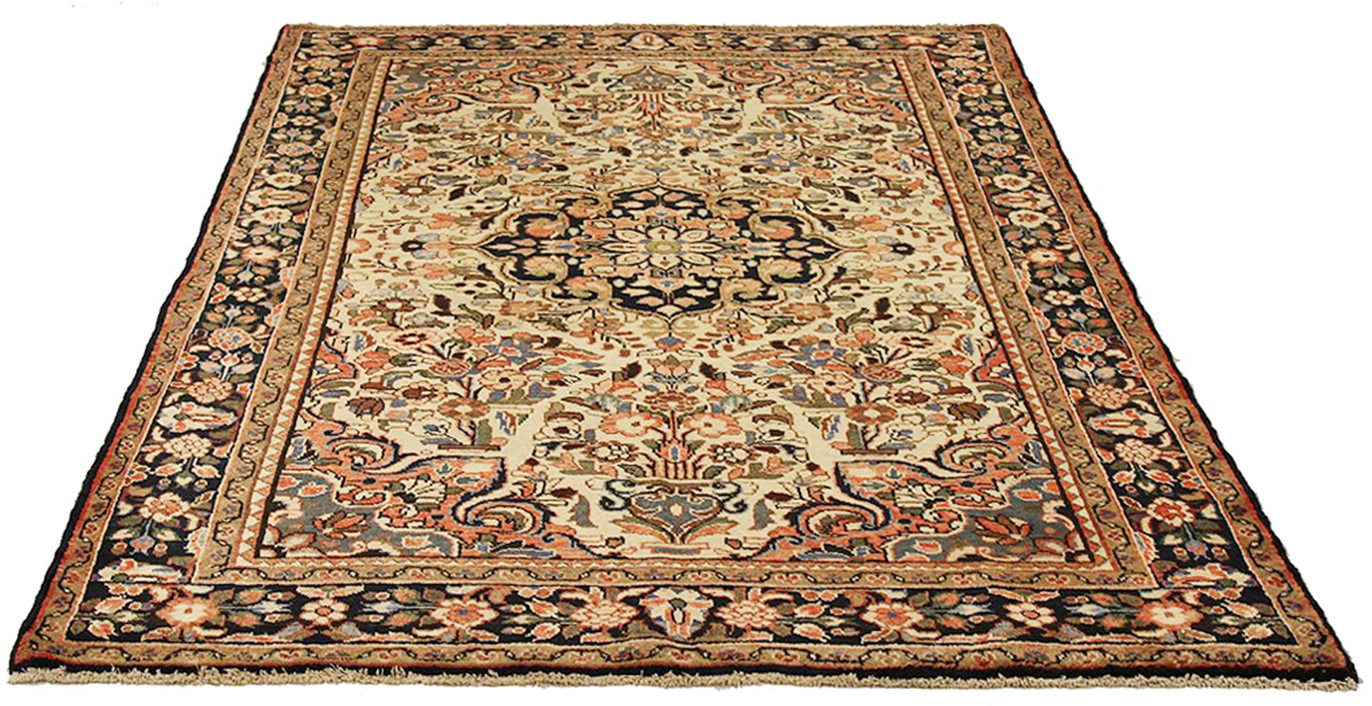Antique Persian rug handwoven from the finest sheep’s wool and colored with all-natural vegetable dyes that are safe for humans and pets. It’s a traditional Hamedan design featuring floral patterns in lovely colors of blue and green over an ivory