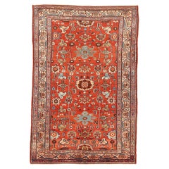 Antiker persischer Hamadan-Teppich mit blauen und roten Blumendetails