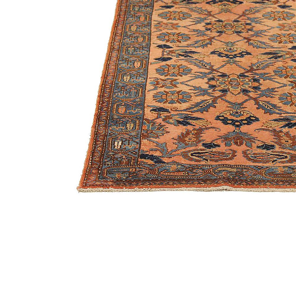 Antiker persischer Hamadan-Teppich mit blauen und braunen Blumendetails auf rosa Feld (Persisch) im Angebot