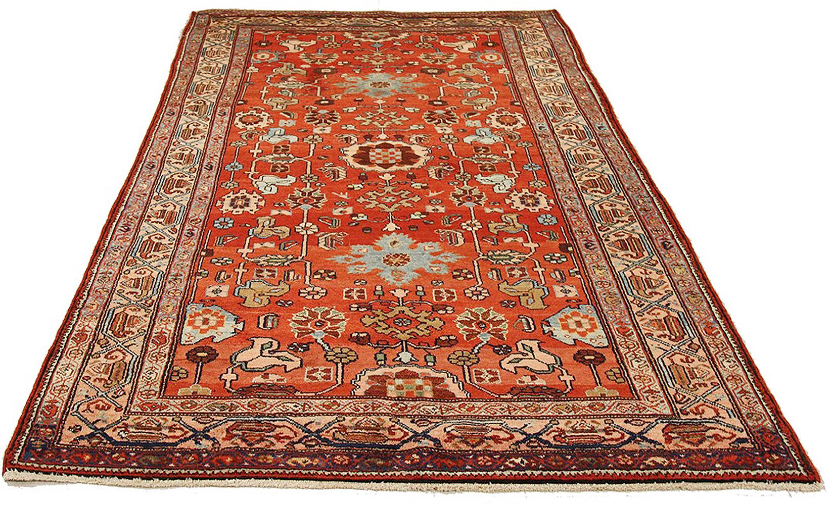 Antique Persian rug handwoven from the finest sheep’s wool and colored with all-natural vegetable dyes that are safe for humans and pets. It’s a traditional Hamedan design featuring floral patterns in lovely colors of blue and red over a beige and