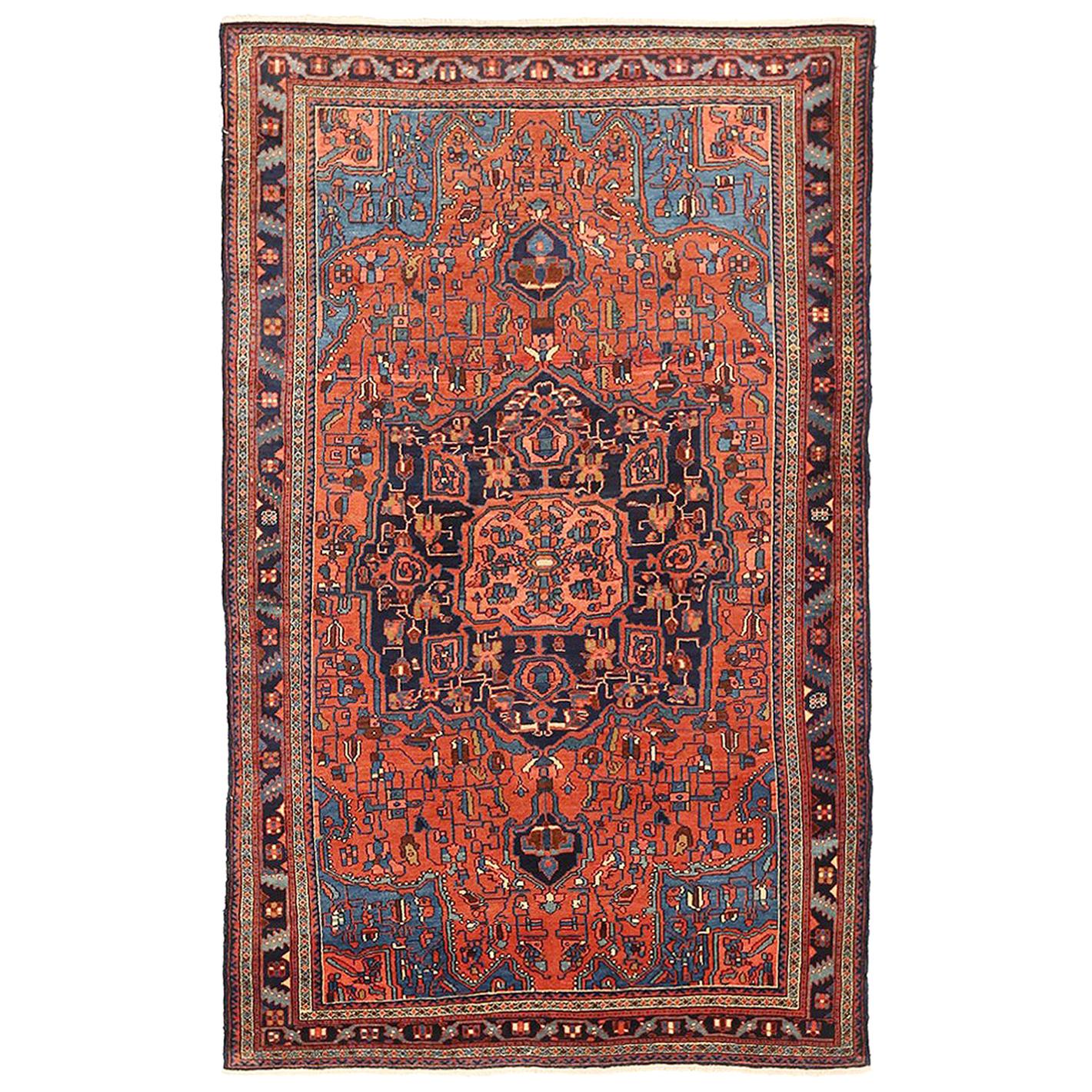 Antique Persian Hamadan Rug with Blue and Red Flower Details on Black Field