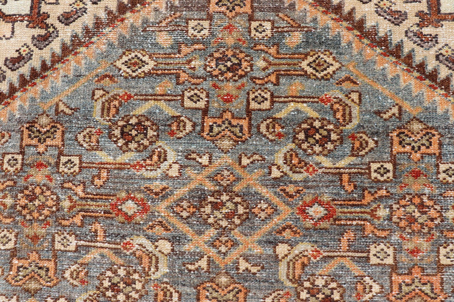20th Century Antique Persian Hamadan Rug with Central Medallion & Sub-Geometric Floral Design For Sale