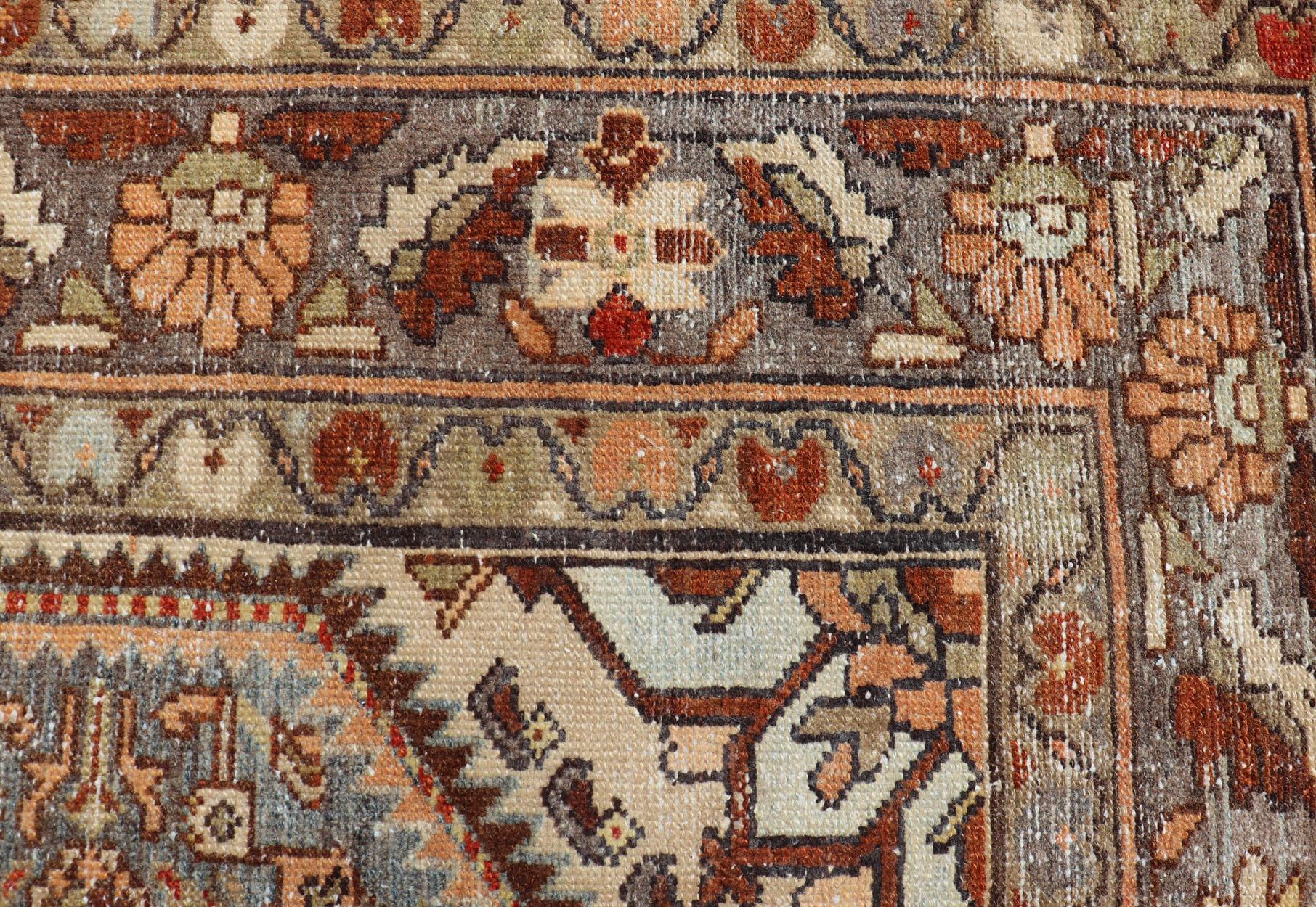 Wool Antique Persian Hamadan Rug with Central Medallion & Sub-Geometric Floral Design For Sale