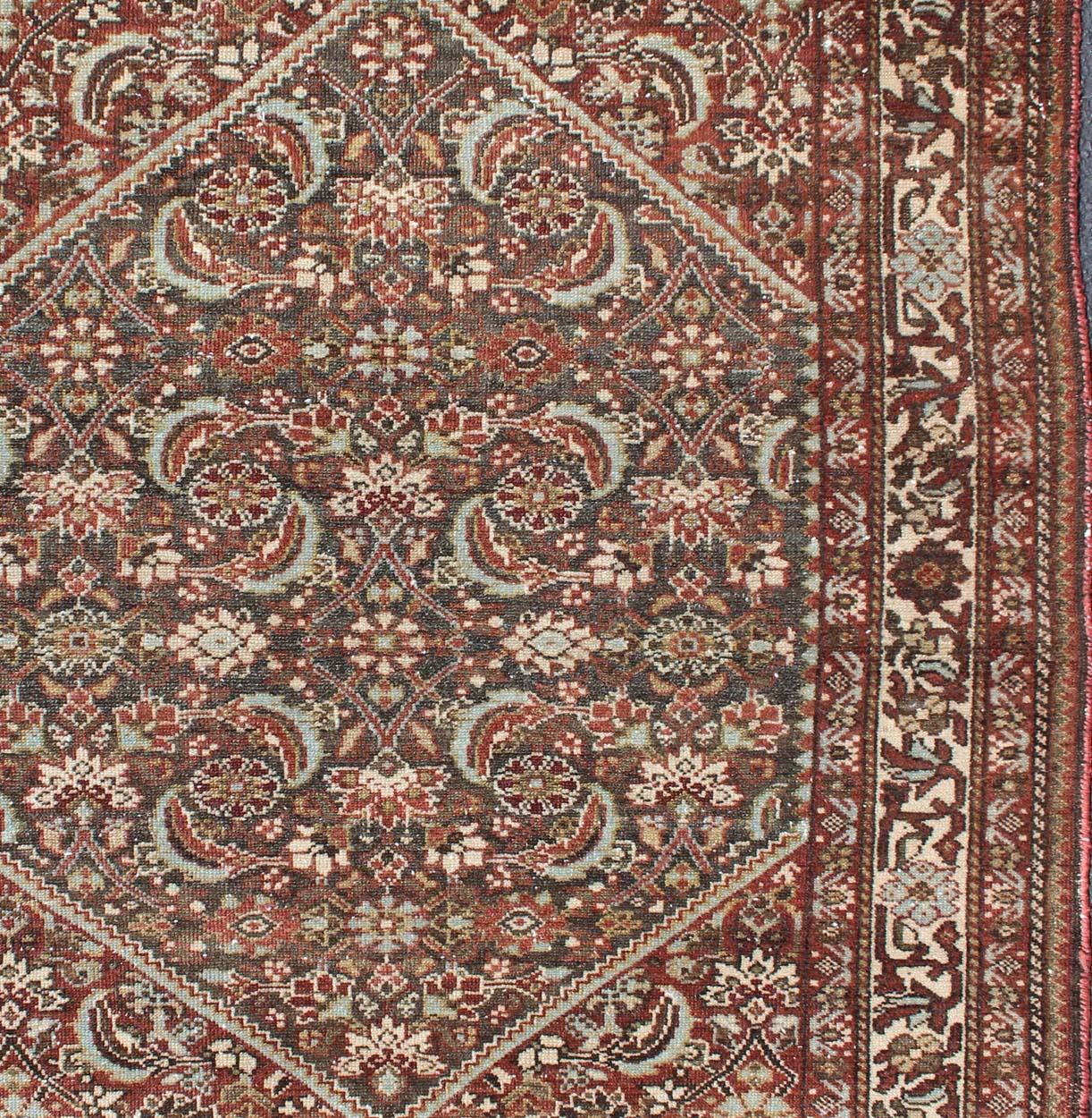 Antique Persian Hamadan rug with colorful geometric design, rug 19-0307, country of origin / type: Iran / Hamadan, circa 1910.

This antique Persian Hamadan rug (circa early 20th century) features a unique blend of colors and an intricately