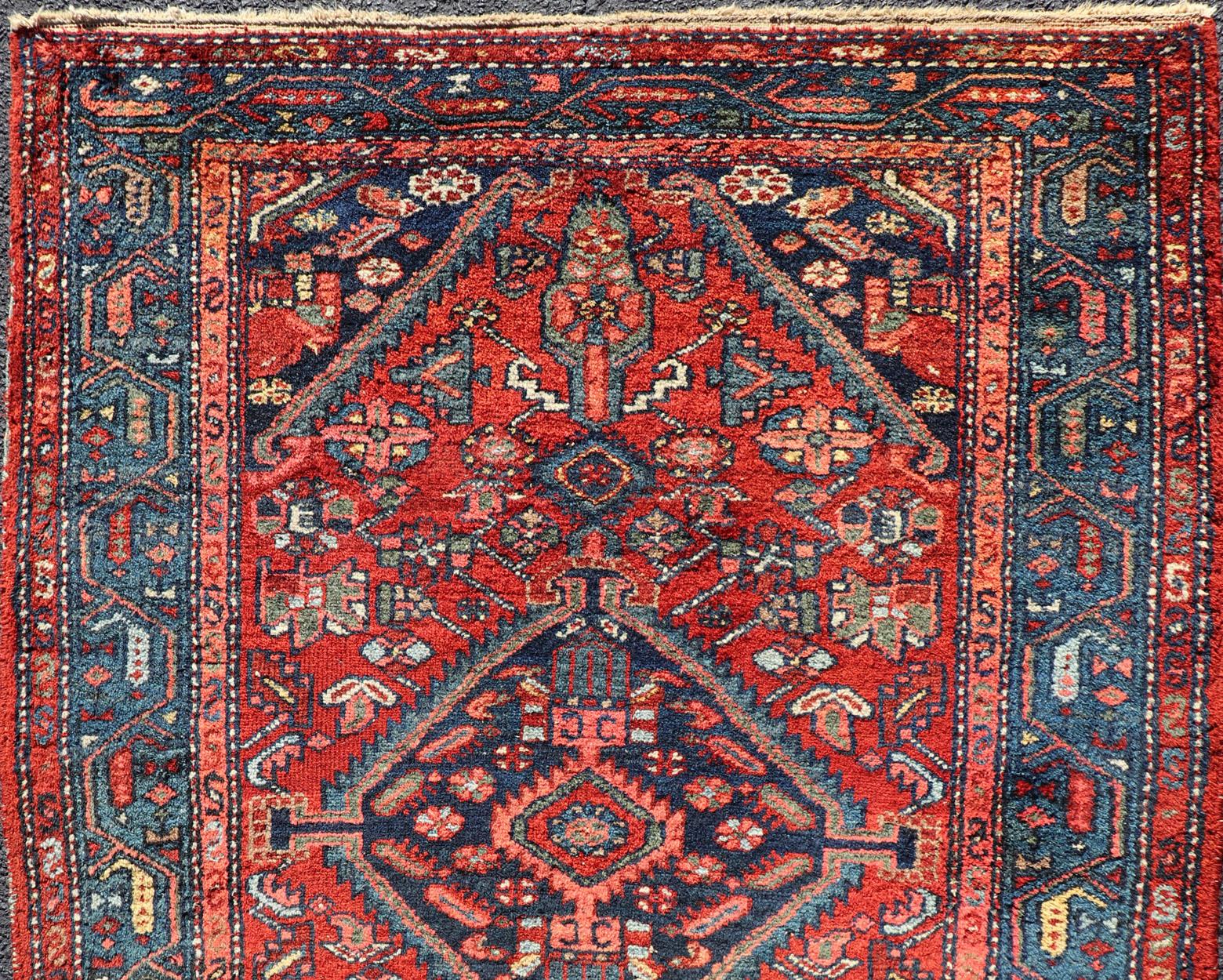 Antique Persian Hamadan rug in rich colors with geometric design, rug R20-1009, country of origin / type: Iran / Hamadan, circa 1920.

This antique Persian Hamadan rug (circa early 20th century) features a unique blend of colors and an intricately