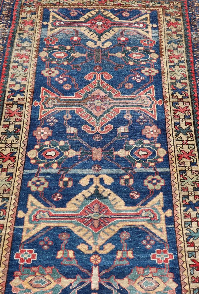 Malayer Antique Persian Hamadan Rug with Colorful Geometric Medallion on a Blue Field For Sale