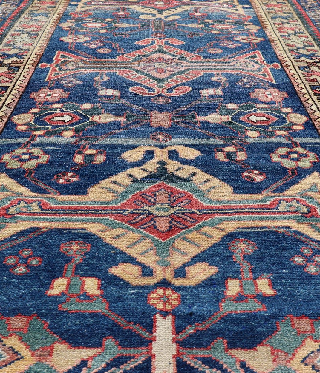 Hand-Knotted Antique Persian Hamadan Rug with Colorful Geometric Medallion on a Blue Field For Sale
