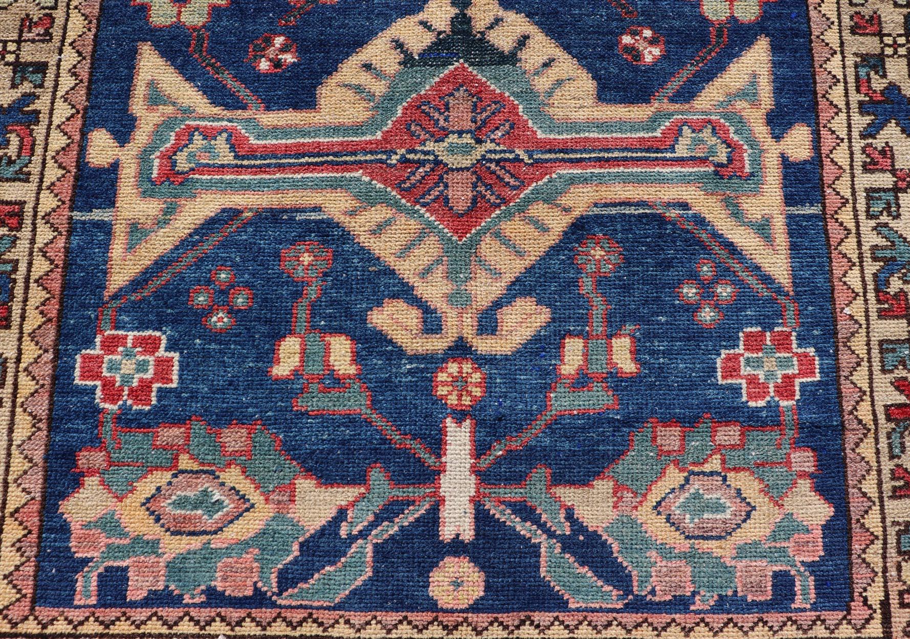 Wool Antique Persian Hamadan Rug with Colorful Geometric Medallion on a Blue Field For Sale